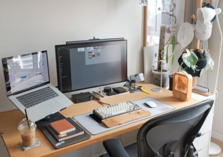 Desktop computer workspace illustrating Gemini for Windows, ChatGPT and Copilot comparison