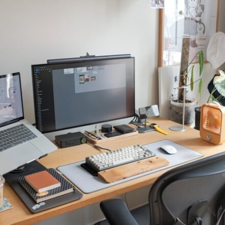 Desktop computer workspace illustrating Gemini for Windows, ChatGPT and Copilot comparison